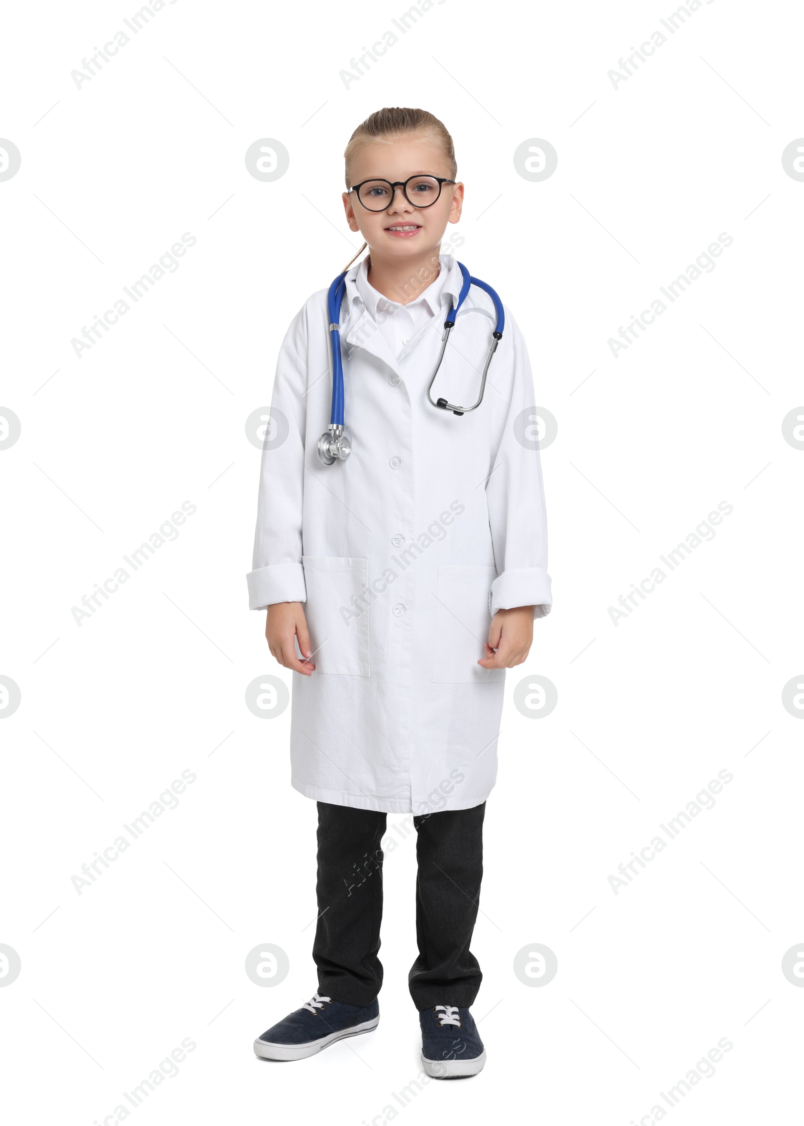 Photo of Little girl with stethoscope pretending to be doctor on white background. Dreaming of future profession