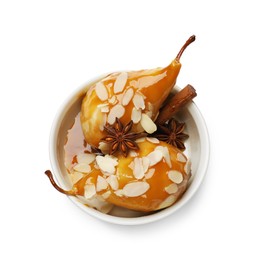 Photo of Delicious pears with caramel sauce, almond flakes and spices isolated on white, top view