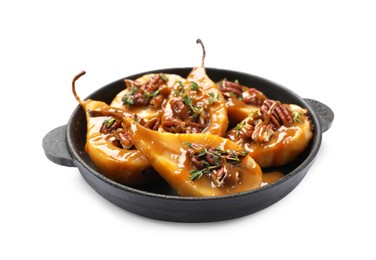 Photo of Delicious pears with caramel sauce, pecan nuts and thyme isolated on white