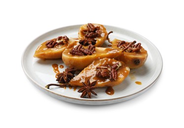 Photo of Delicious pears with caramel sauce, pecan nuts and anise stars isolated on white