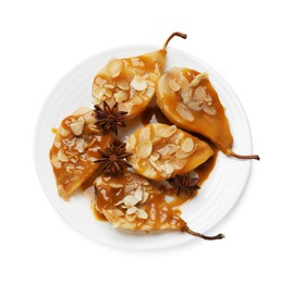 Photo of Delicious pears with caramel sauce, almond flakes and anise stars isolated on white, top view