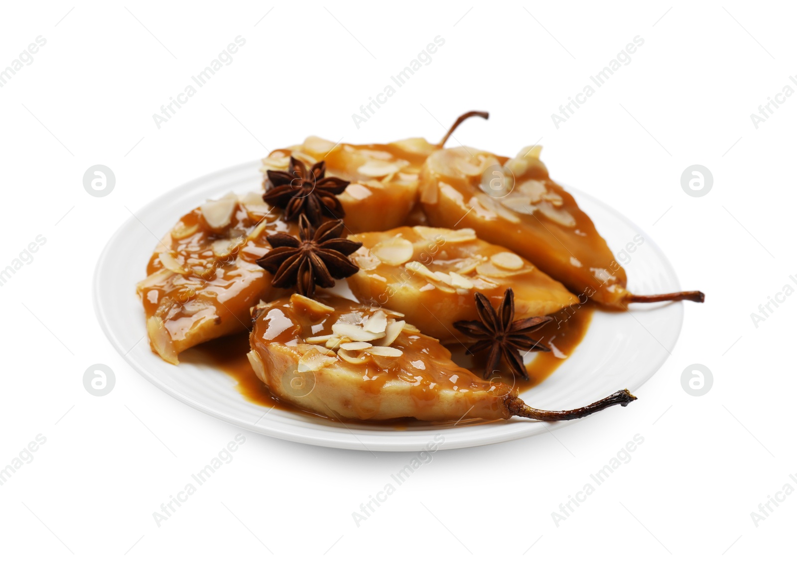 Photo of Delicious pears with caramel sauce, almond flakes and anise stars isolated on white