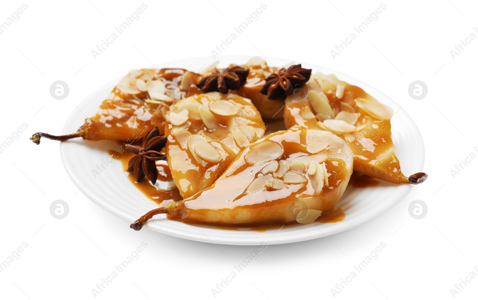 Photo of Delicious pears with caramel sauce, almond flakes and anise stars isolated on white