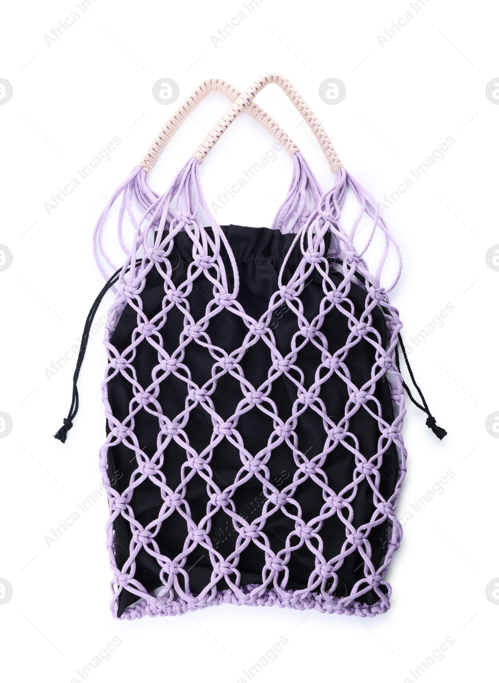 Photo of Handmade macrame shopping bag isolated on white, top view