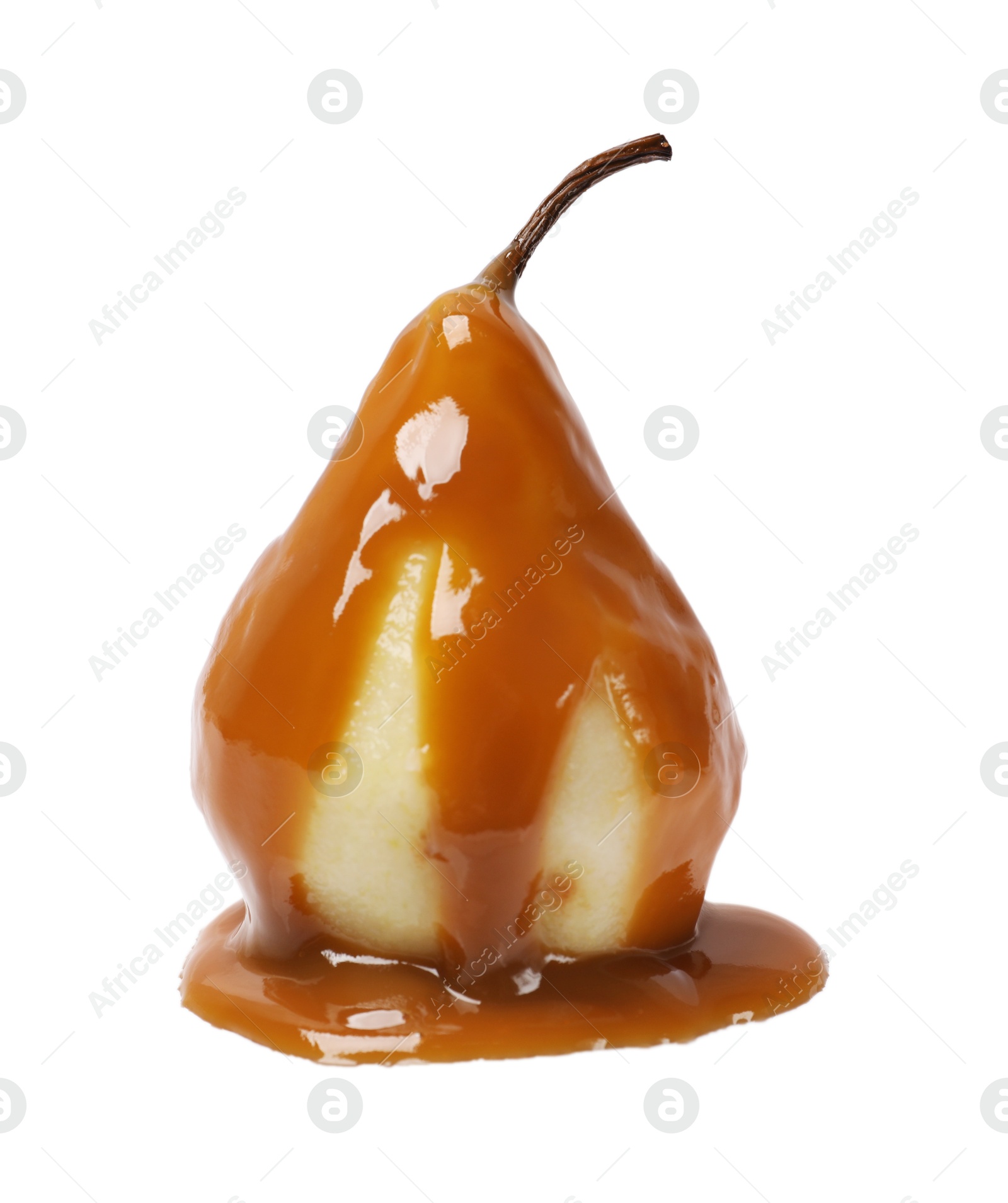 Photo of Delicious pear with caramel sauce isolated on white