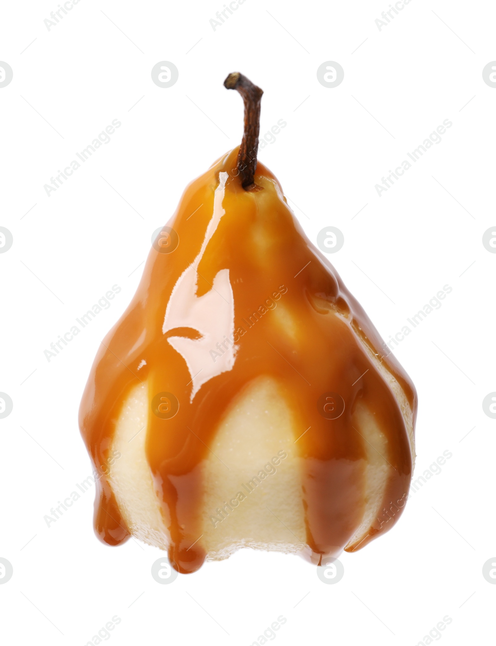 Photo of Delicious pear with caramel sauce isolated on white