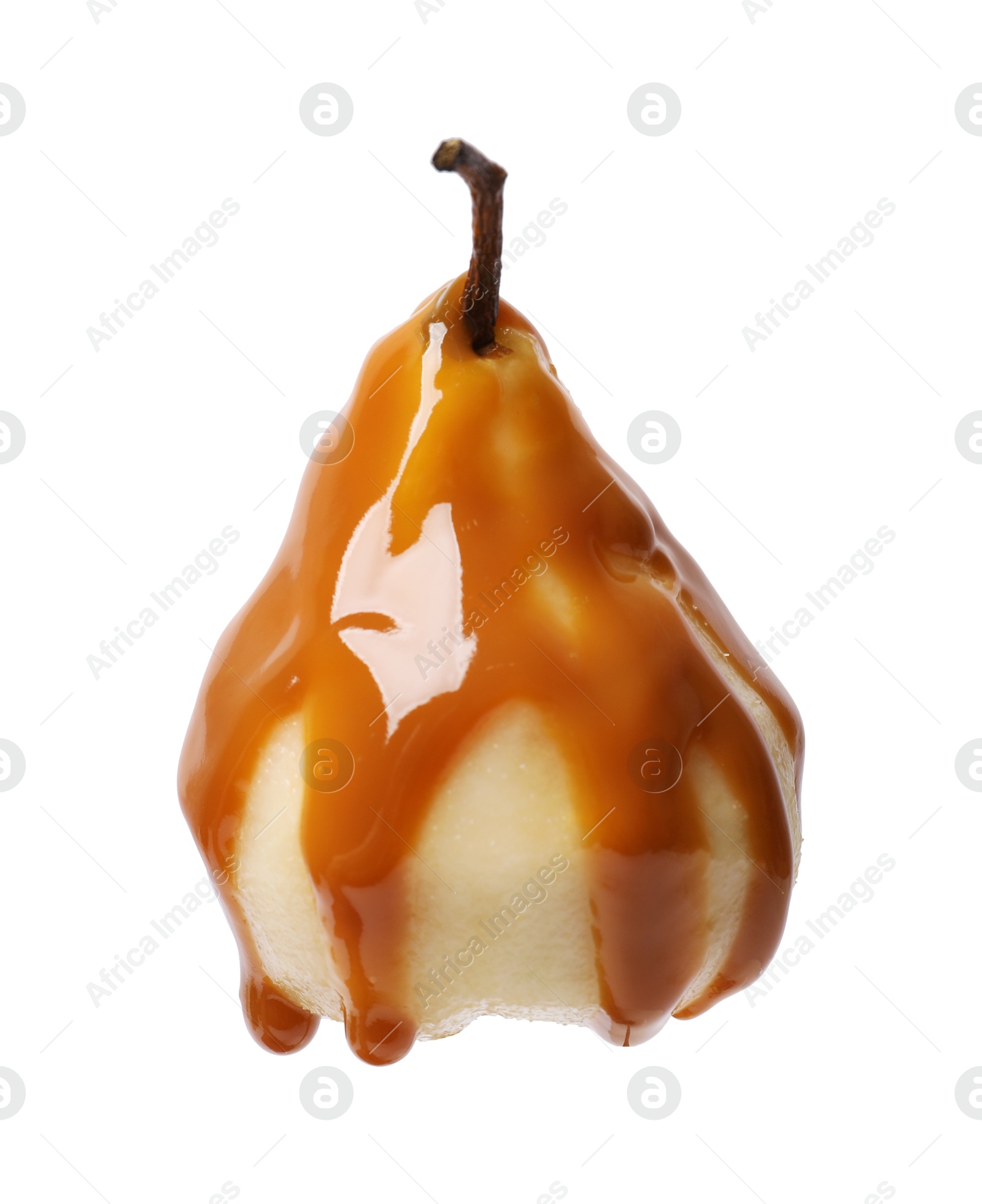 Photo of Delicious pear with caramel sauce isolated on white