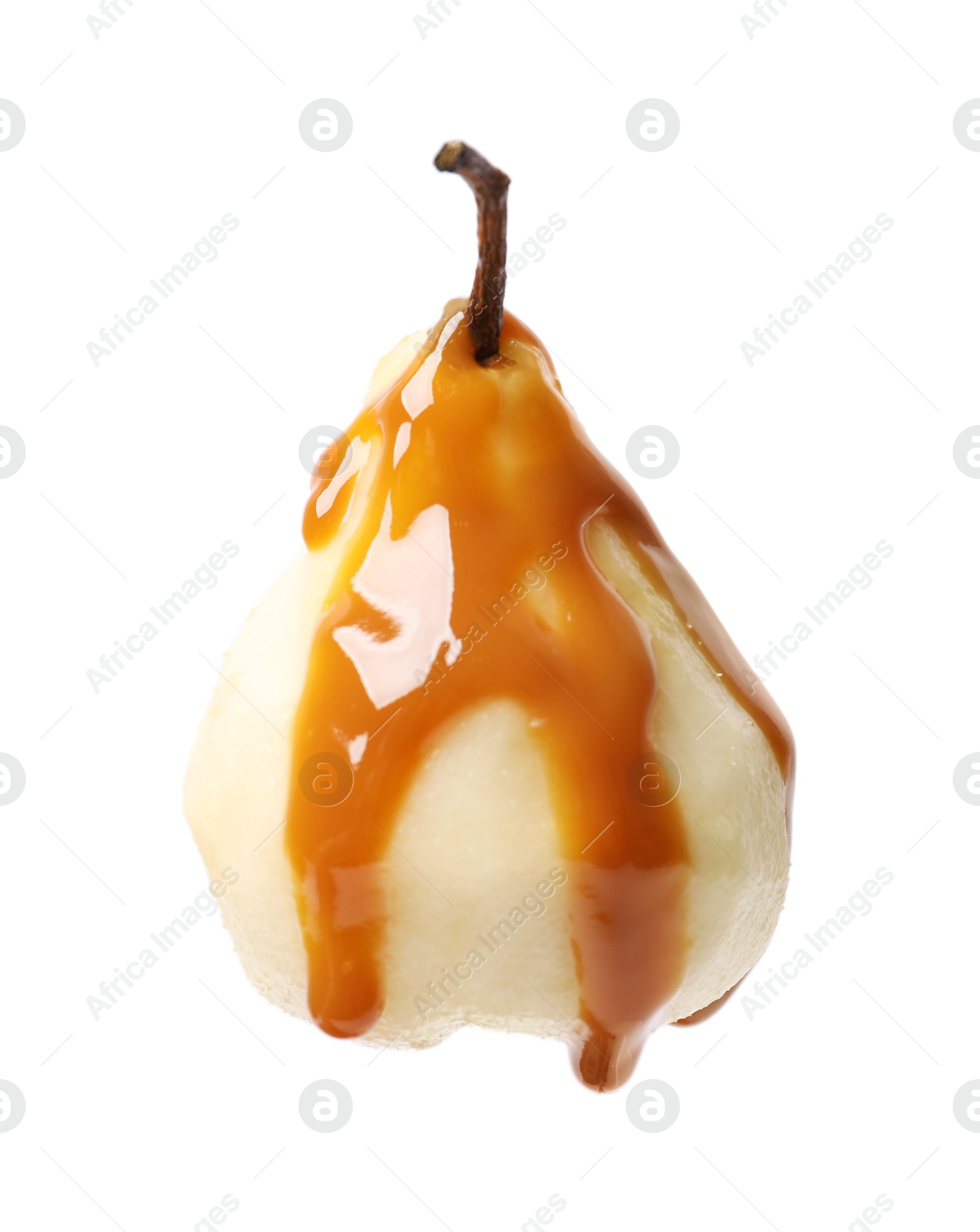 Photo of Delicious pear with caramel sauce isolated on white