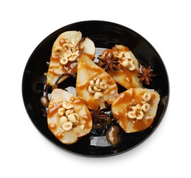 Photo of Delicious pears with caramel sauce, nuts and anise stars isolated on white, top view