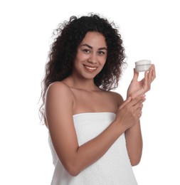 Photo of Beautiful woman with jar of cream on white background