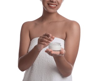 Photo of Young woman with jar of cream on white background, closeup