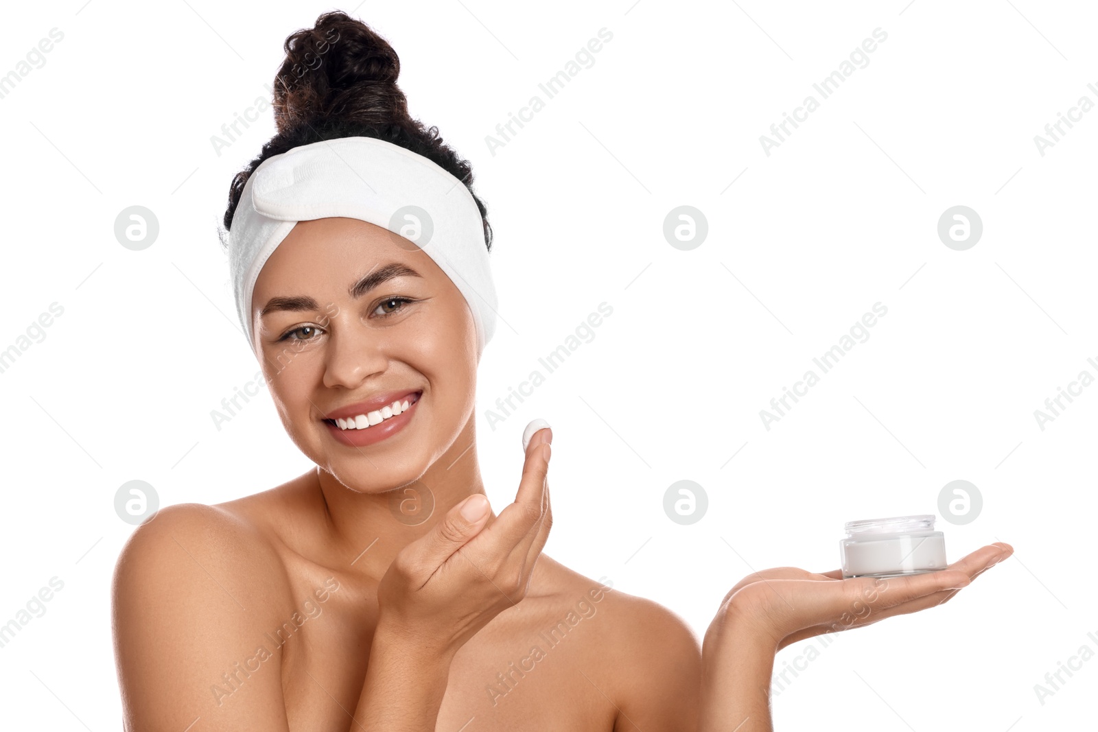 Photo of Beautiful young woman with jar of cream on white background