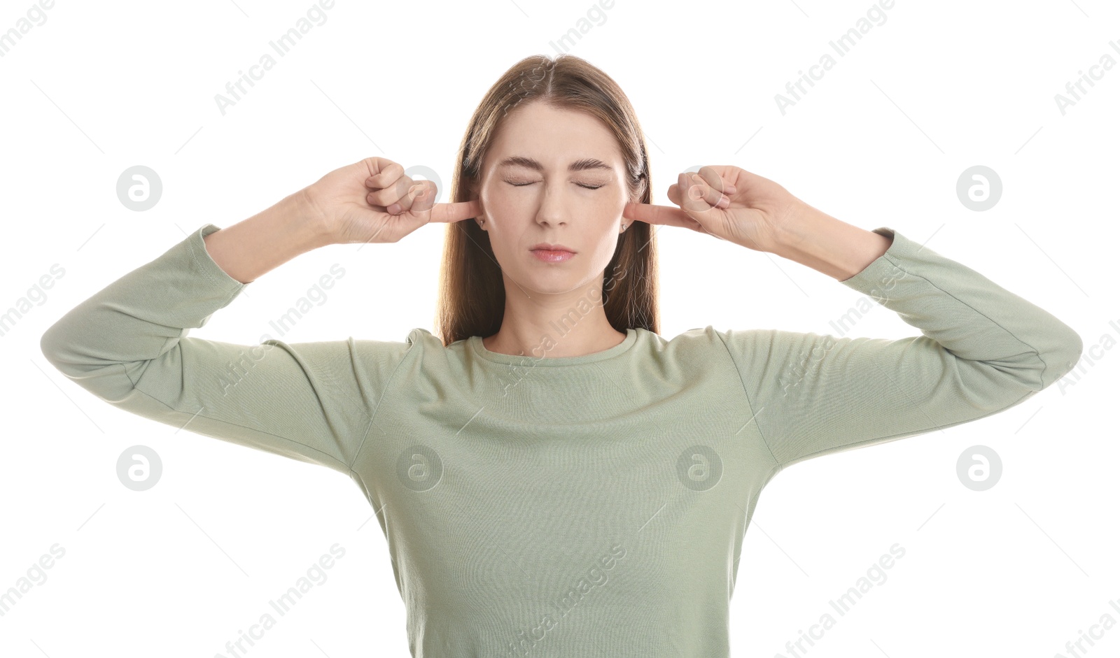 Photo of Woman covering her ears with fingers on white background