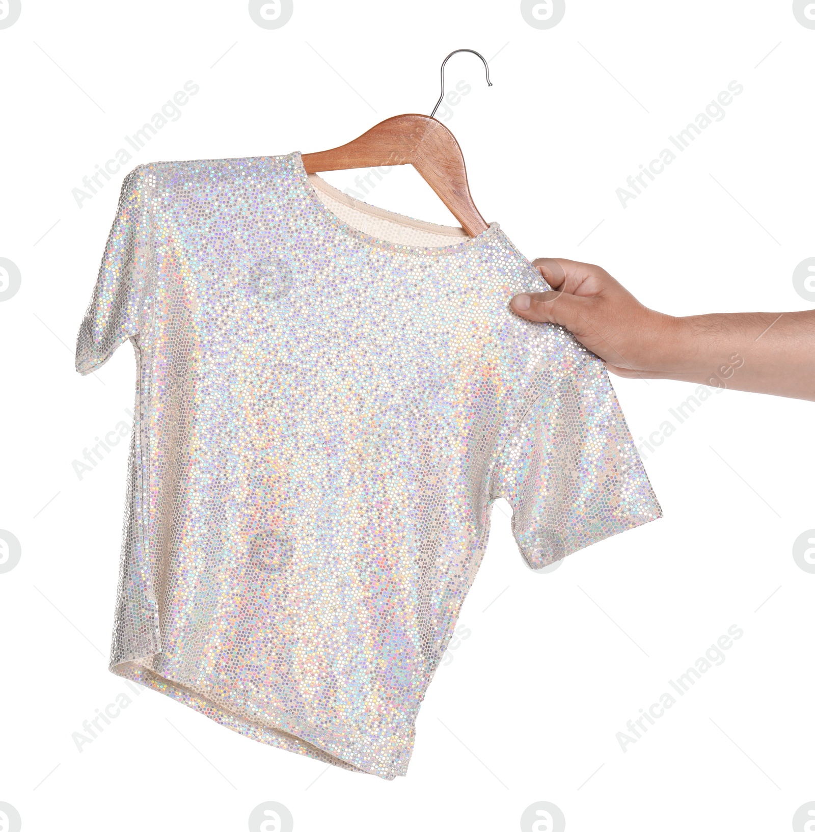 Photo of Woman holding hanger with t-shirt on white background, closeup