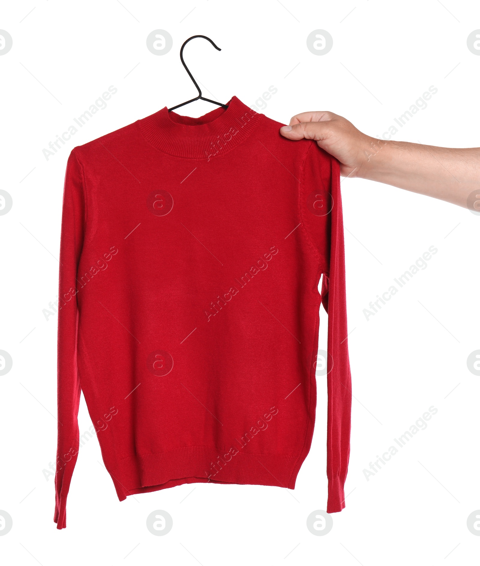 Photo of Woman holding hanger with red long sleeve on white background, closeup