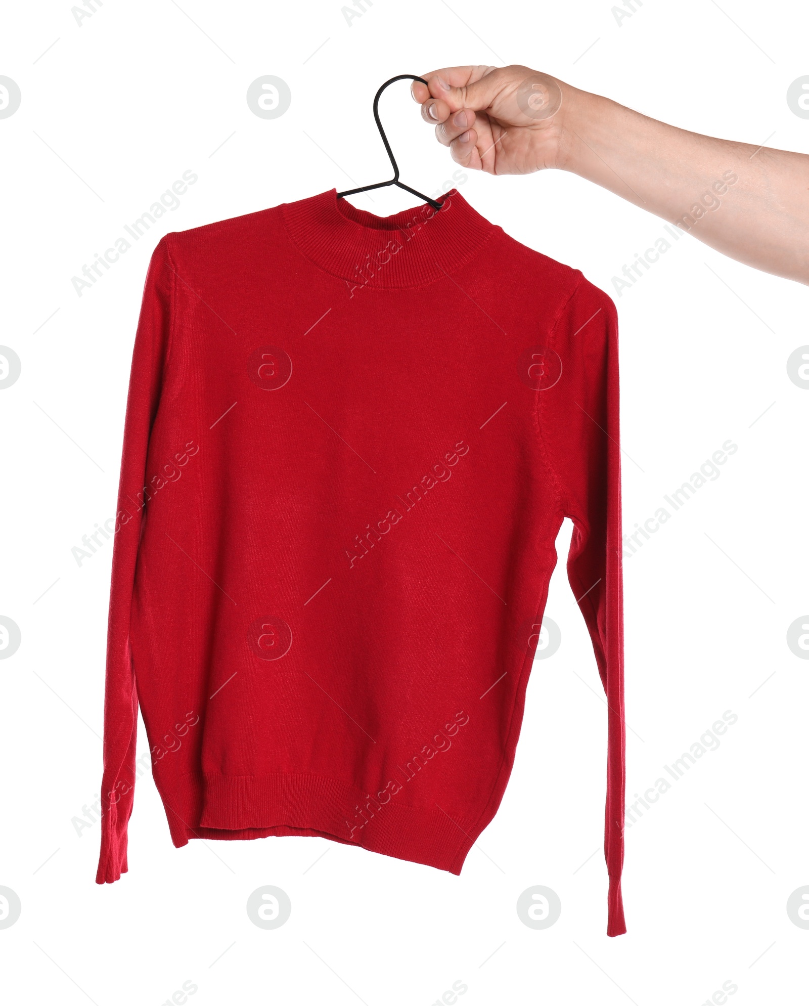 Photo of Woman holding hanger with red long sleeve on white background, closeup