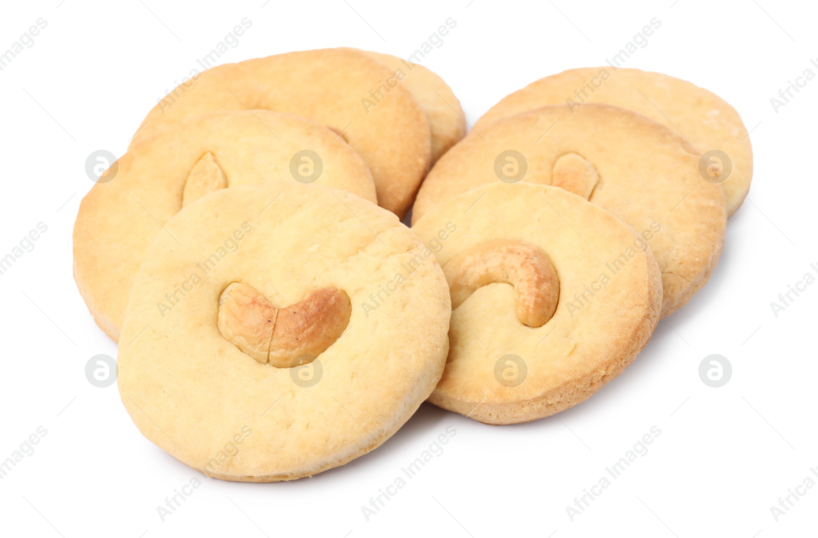 Photo of Many tasty cashew cookies isolated on white