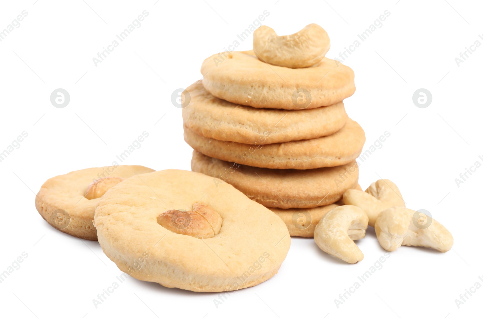 Photo of Many tasty cashew cookies isolated on white