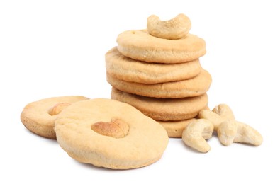 Photo of Many tasty cashew cookies isolated on white