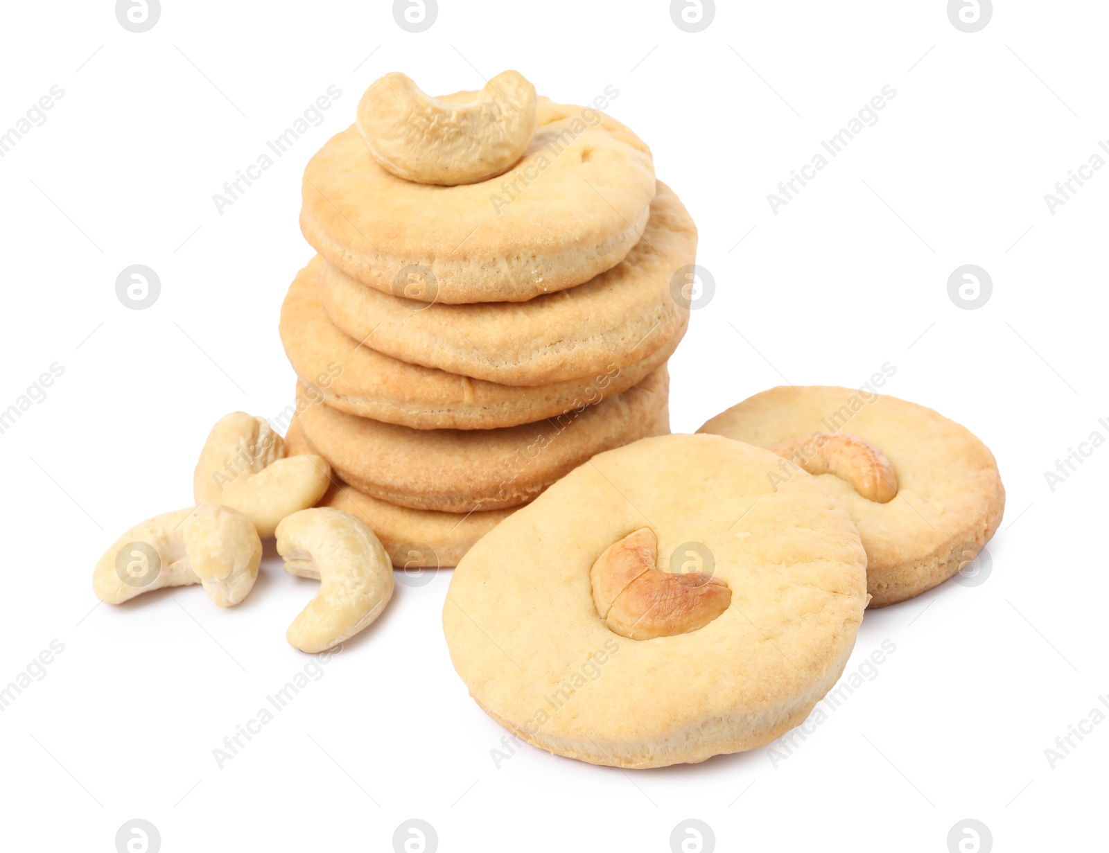 Photo of Many tasty cashew cookies isolated on white