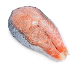 Photo of One frozen salmon steak isolated on white