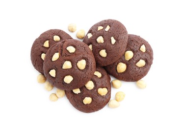 Photo of Tasty chocolate cookies with hazelnuts isolated on white, top view