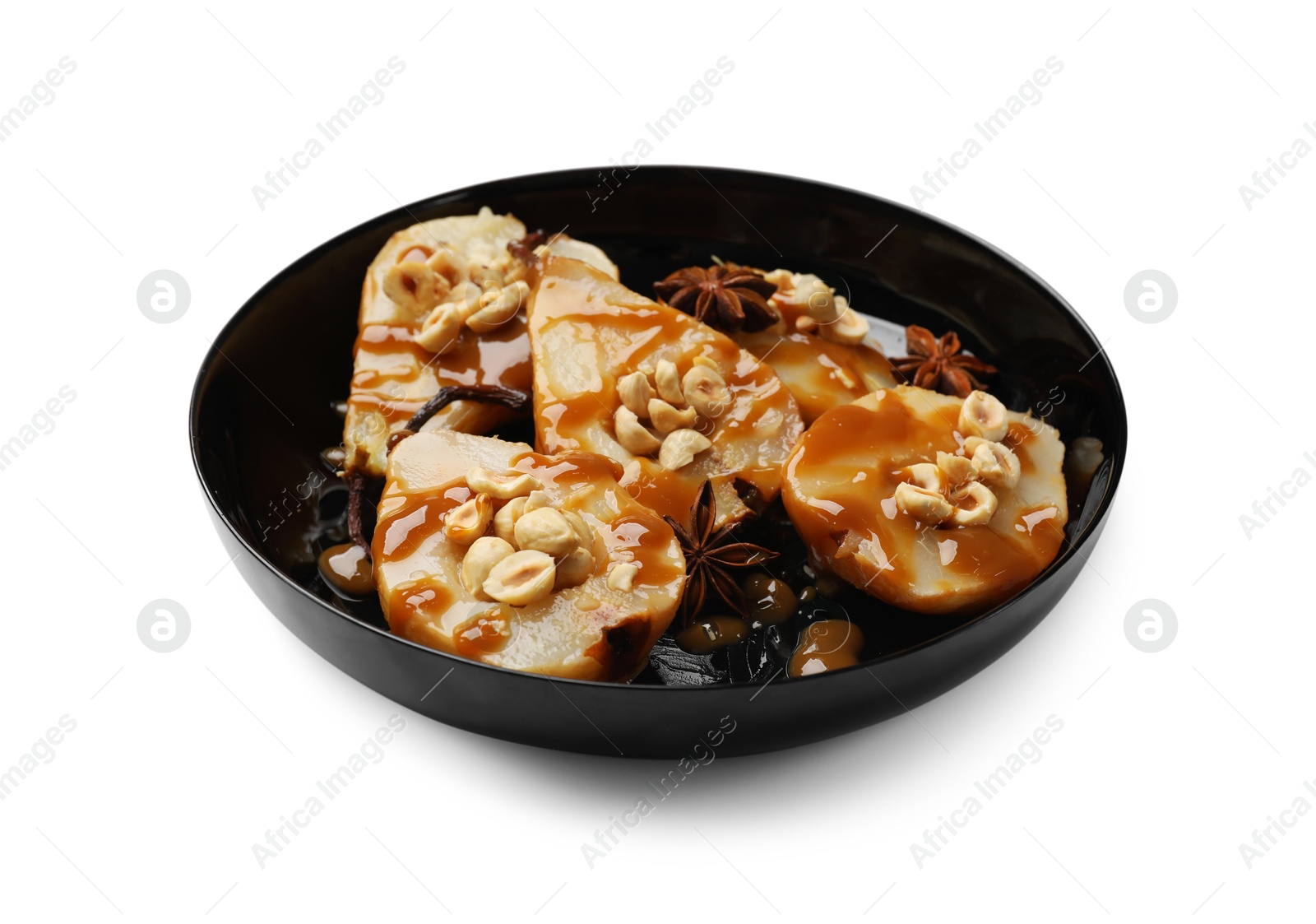 Photo of Delicious pears with caramel sauce, nuts and anise stars isolated on white