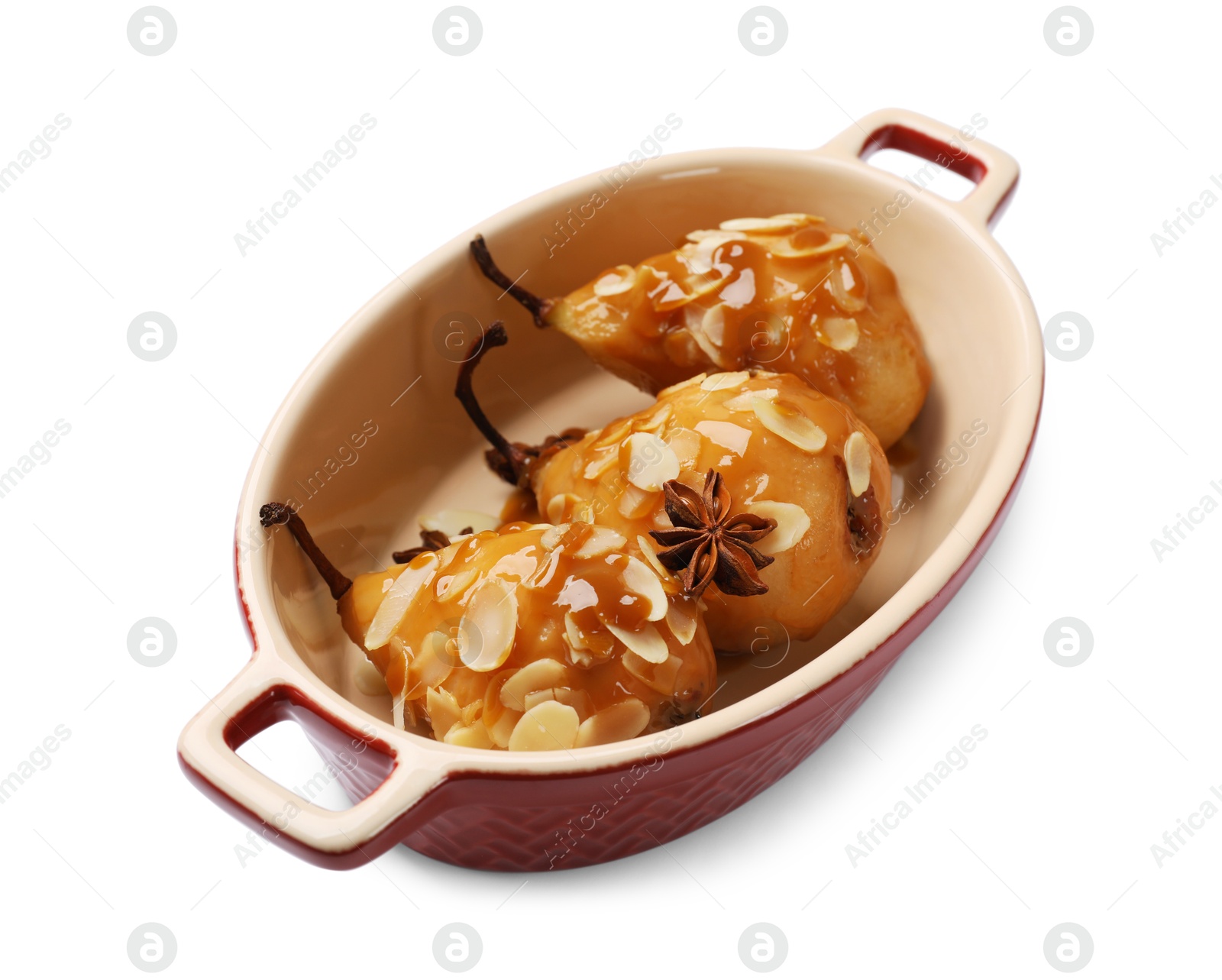 Photo of Delicious pears with caramel sauce, almond flakes and anise stars isolated on white