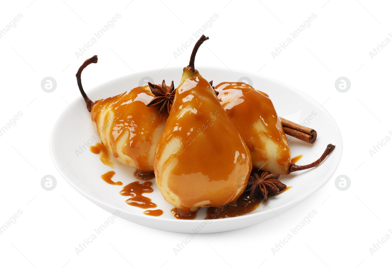 Photo of Delicious pears with caramel sauce and spices isolated on white