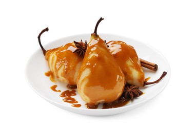 Delicious pears with caramel sauce and spices isolated on white