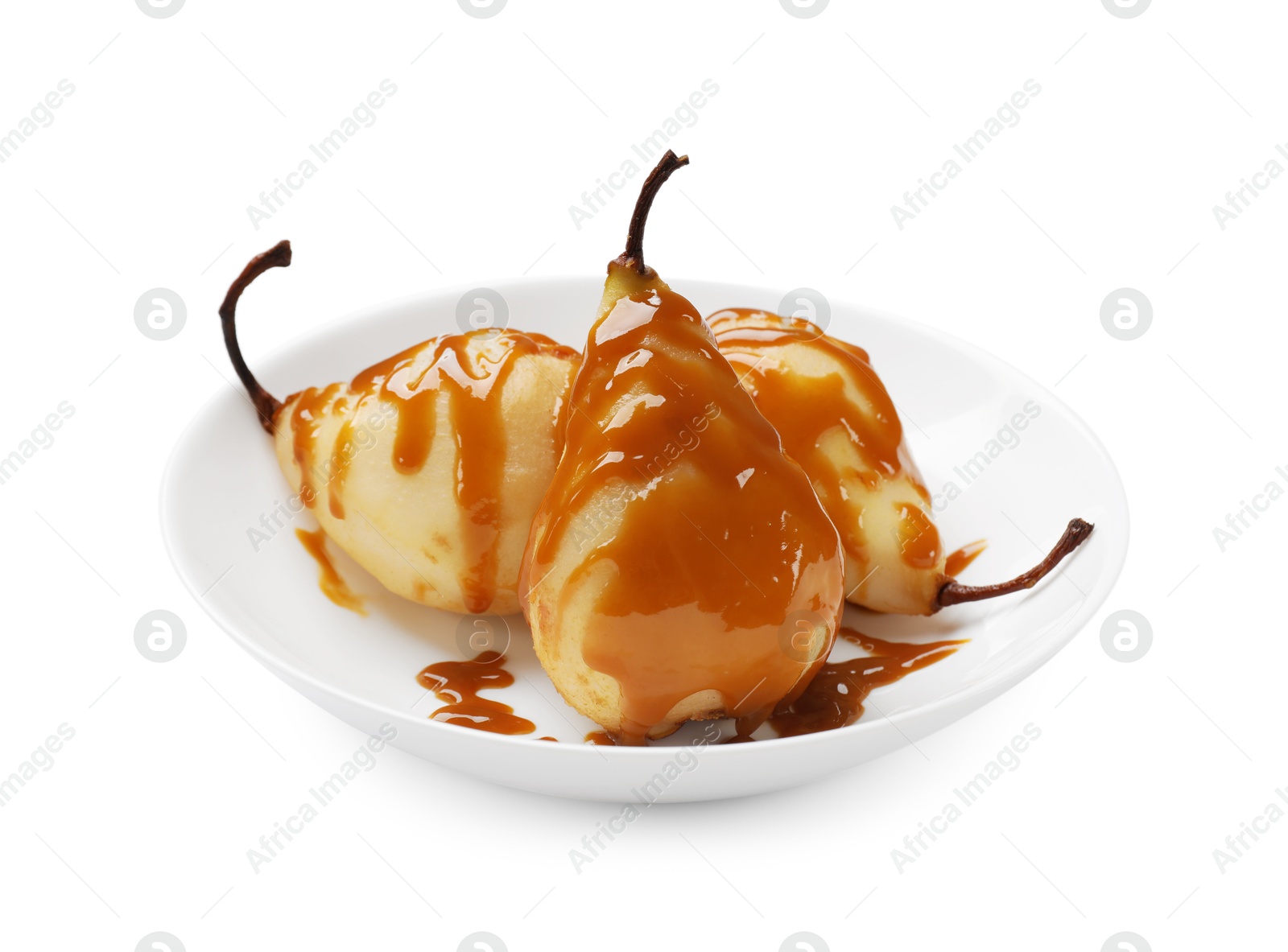 Photo of Delicious pears with caramel sauce isolated on white