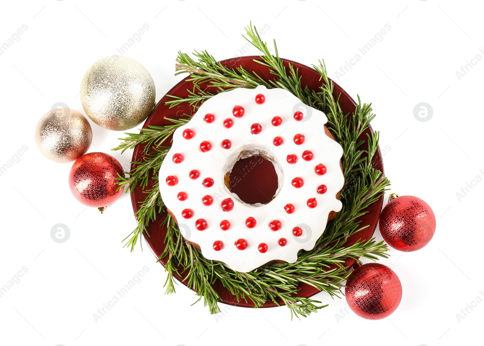 Photo of Beautifully decorated Christmas cake and baubles on white background, top view