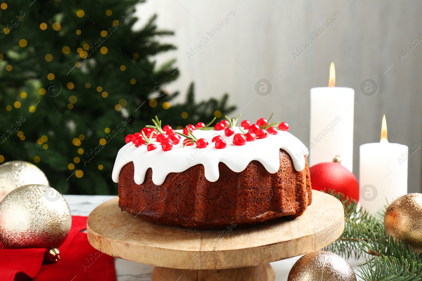 Photo of Traditional classic Christmas cake and decor on table