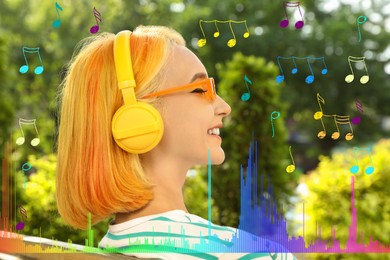 Image of Beautiful young woman with bright dyed hair and headphones in park. Music notes and sound waves near her