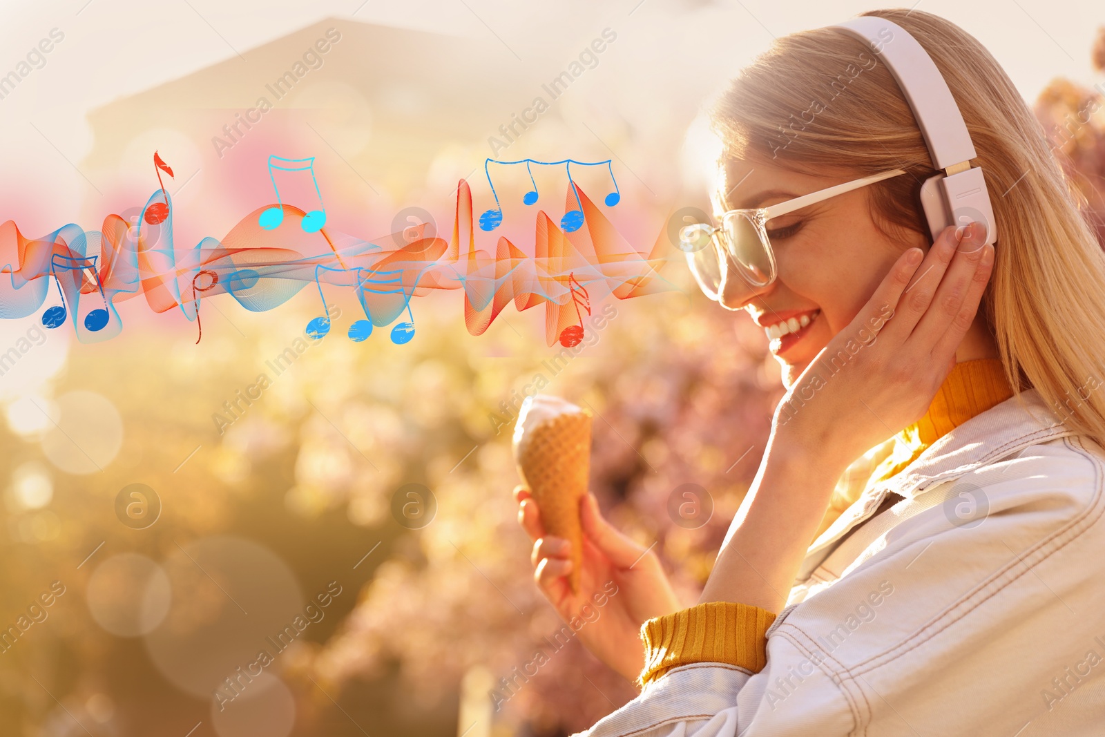 Image of Young woman with ice cream and headphones outdoors on sunny day. Music notes and sound waves near her