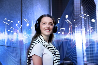 Image of Smiling woman with headphones outdoors. Music notes and sound waves flying near her