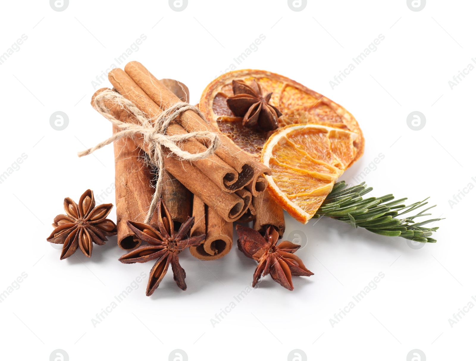 Photo of Different aromatic spices isolated on white. Christmas season