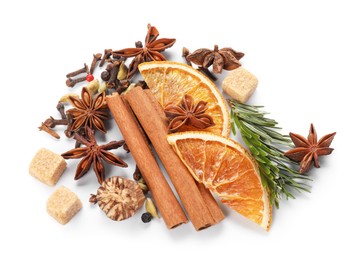 Photo of Different aromatic spices isolated on white, top view. Christmas season