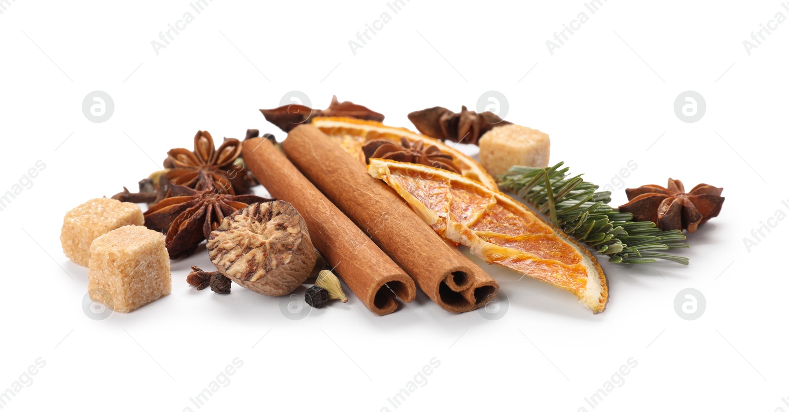 Photo of Different aromatic spices isolated on white. Christmas season