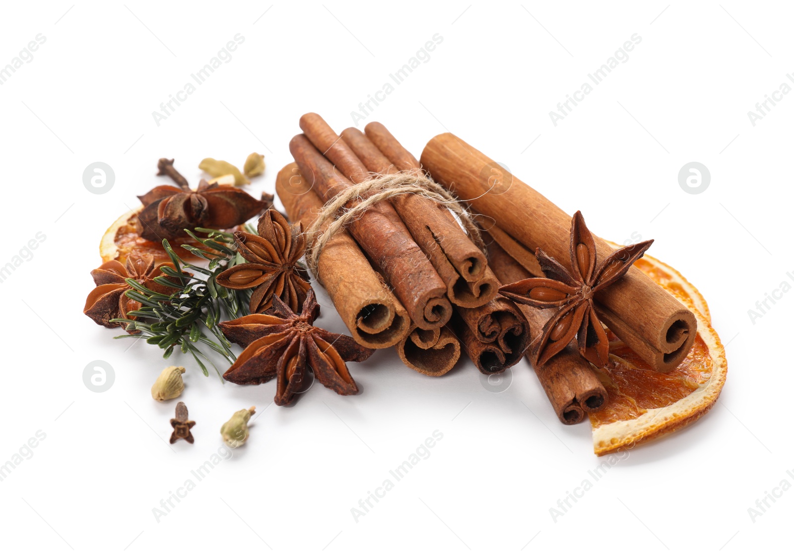 Photo of Different aromatic spices isolated on white. Christmas season