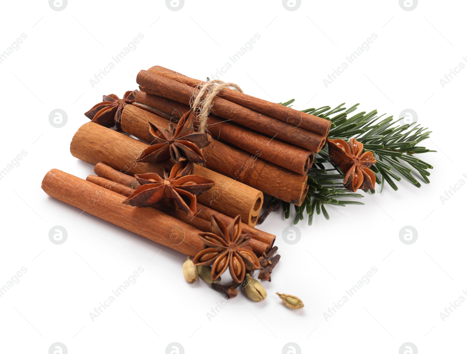 Photo of Different aromatic spices isolated on white. Christmas season