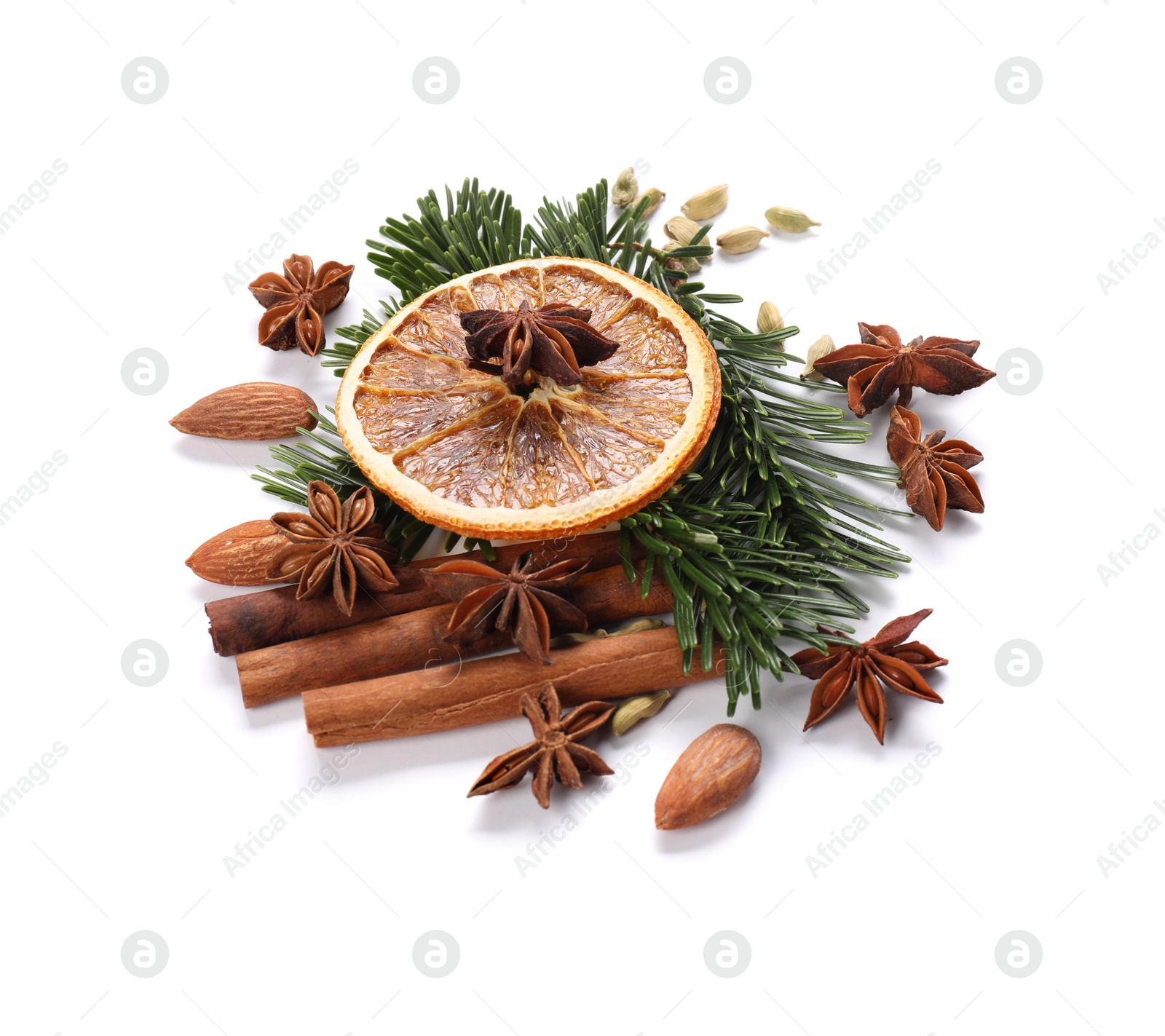 Photo of Different aromatic spices isolated on white. Christmas season