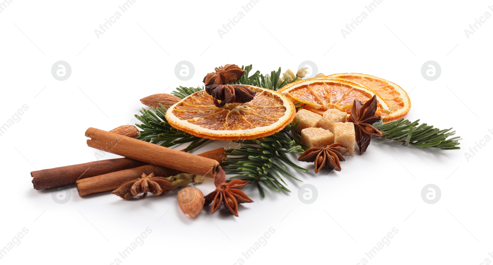 Photo of Different aromatic spices isolated on white. Christmas season