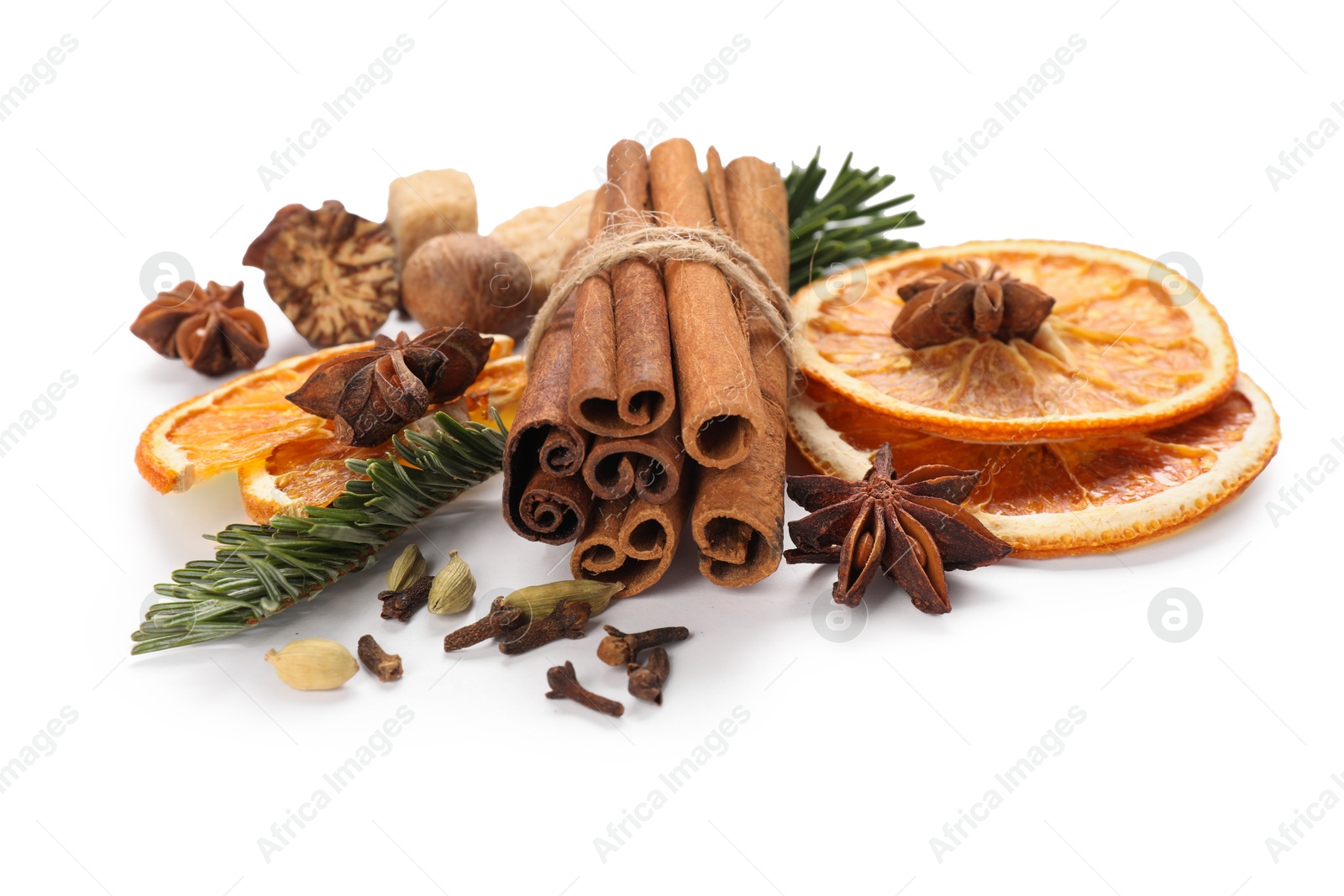 Photo of Different aromatic spices isolated on white. Christmas season