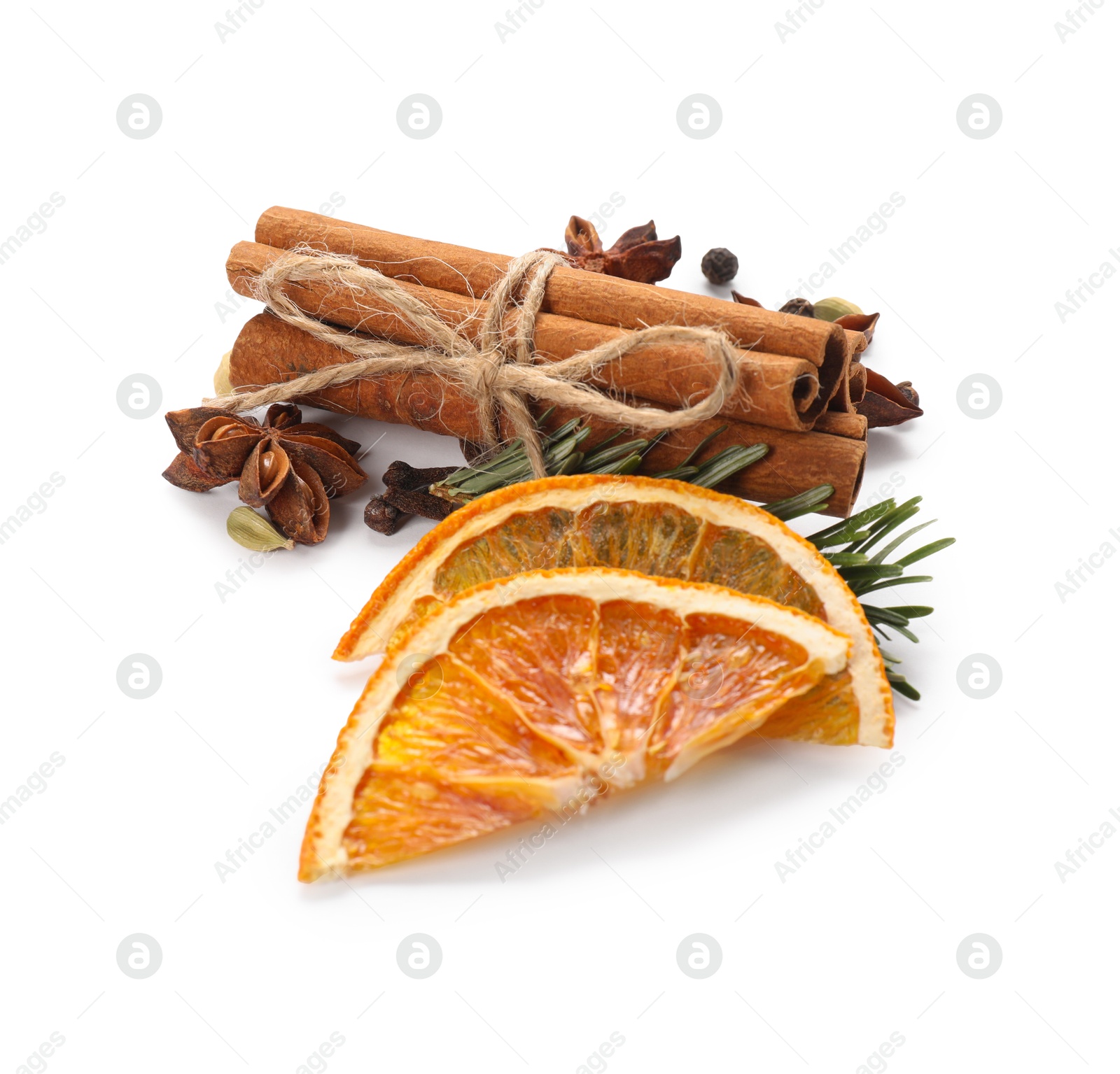 Photo of Different aromatic spices isolated on white. Christmas season