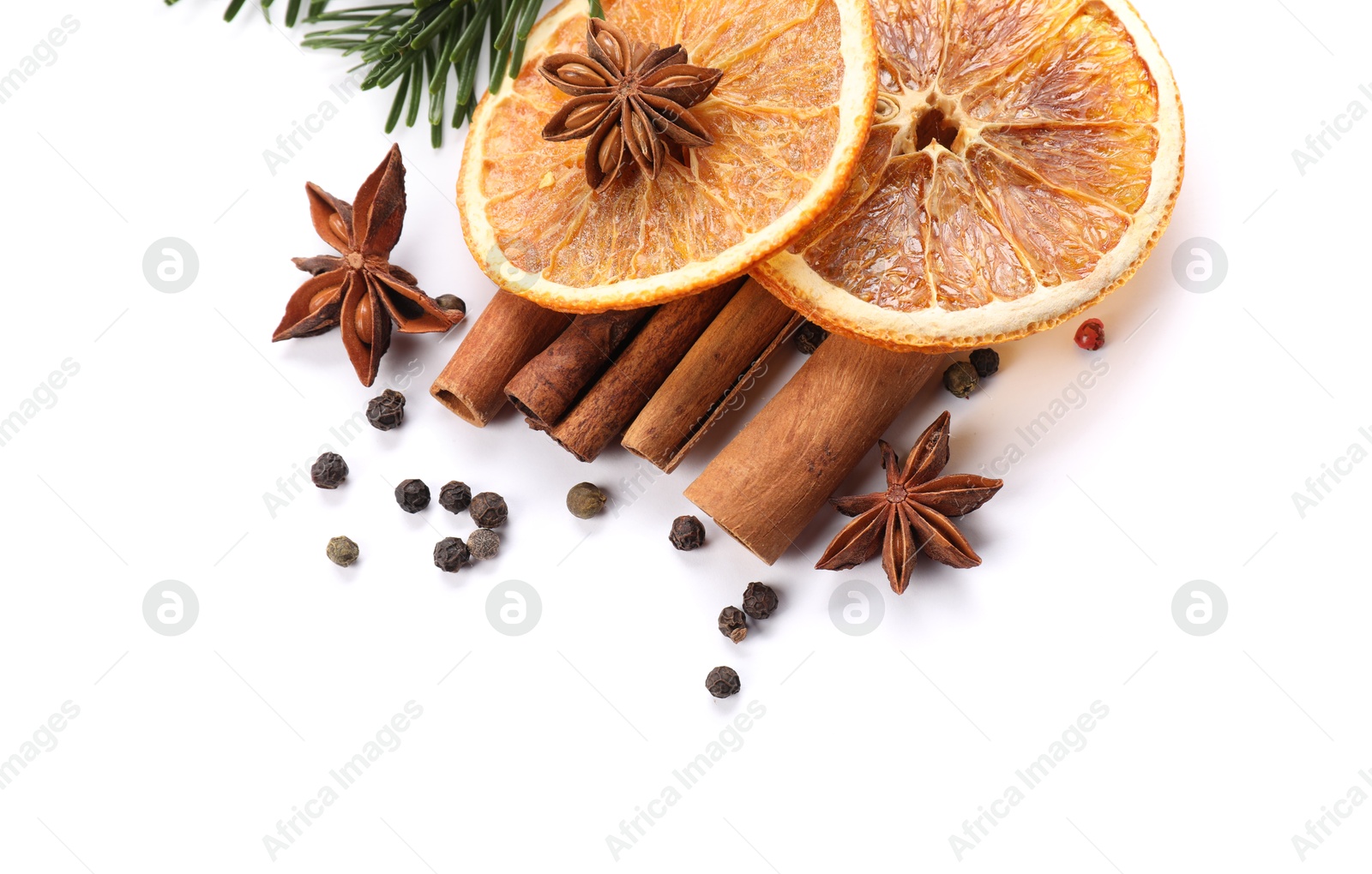 Photo of Different aromatic spices isolated on white. Christmas season