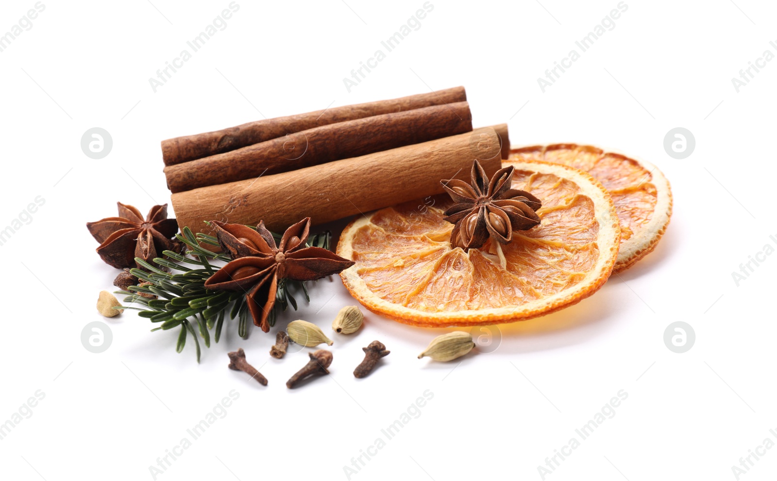 Photo of Different aromatic spices isolated on white. Christmas season