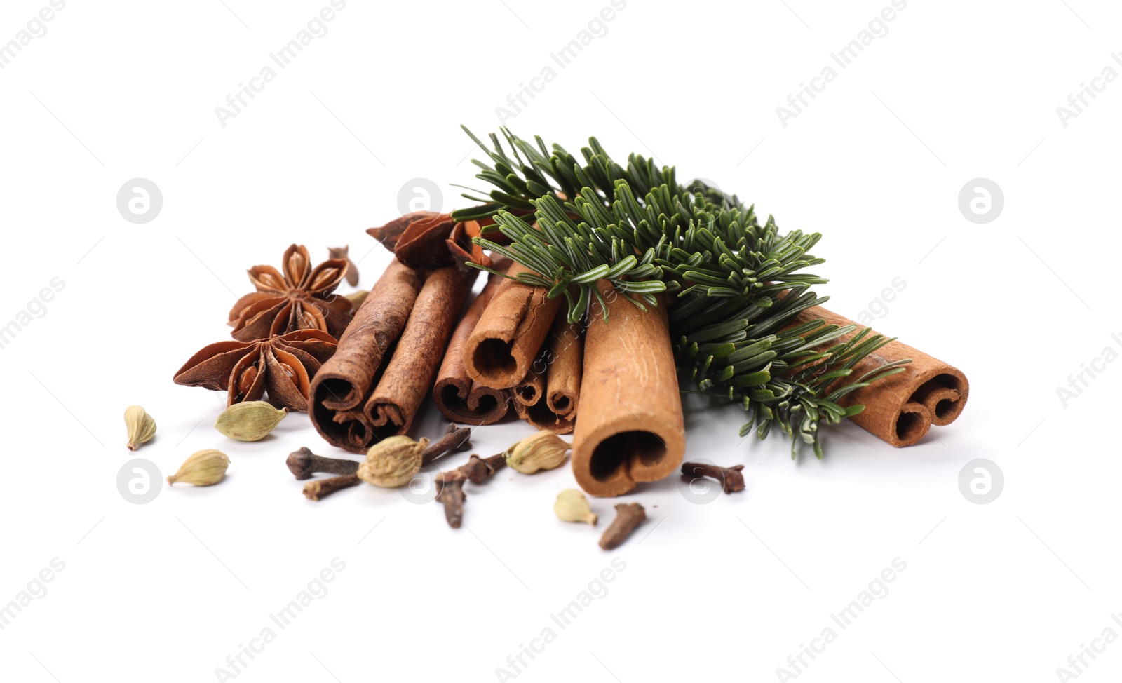 Photo of Different aromatic spices isolated on white. Christmas season