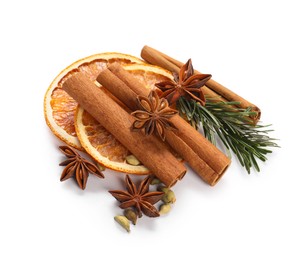 Photo of Different aromatic spices isolated on white. Christmas season