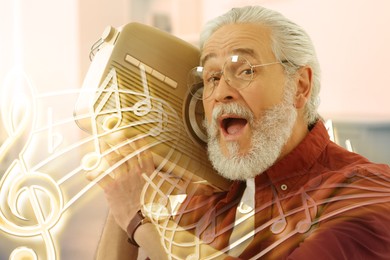 Image of Senior man with retro radio receiver at home. Music notes flying out of device